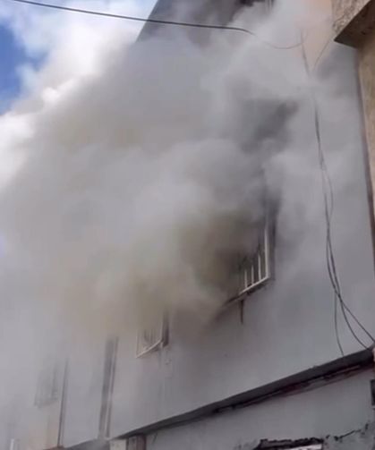 Onikişubat Belediyesi personelinden ev yangınına örnek müdahale