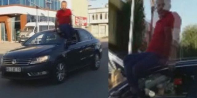 Konya'da korkutan olay! Otomobilin tavanına oturup, direksiyonu ayağıyla kontrol ederek araç kullandı