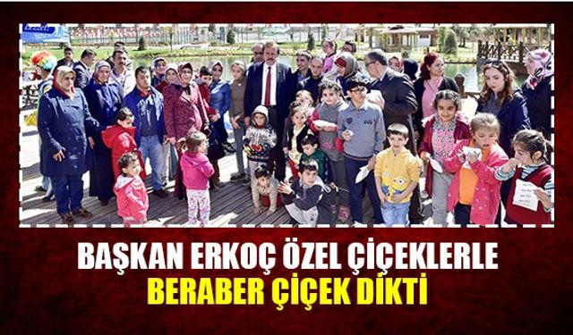 Başkan Erkoç özel çiçeklerle beraber çiçek dikti